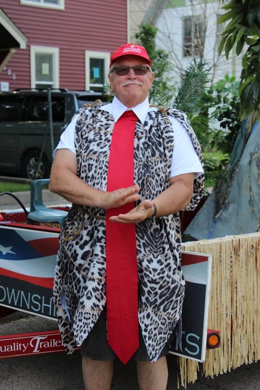 Carl Strathmann as Caveman in July Parade
