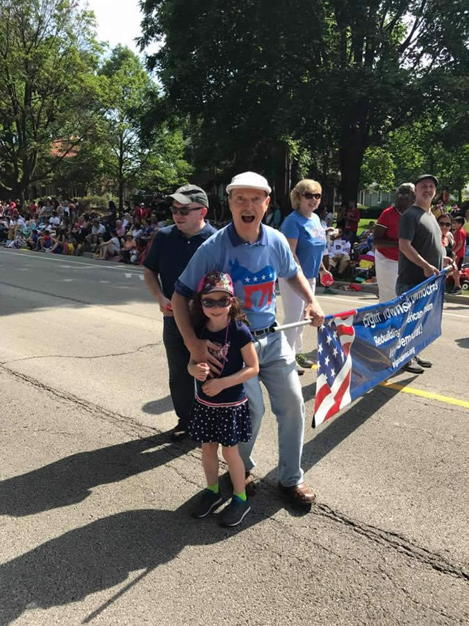 Frank Imhoff Getting Hugged at a Parade