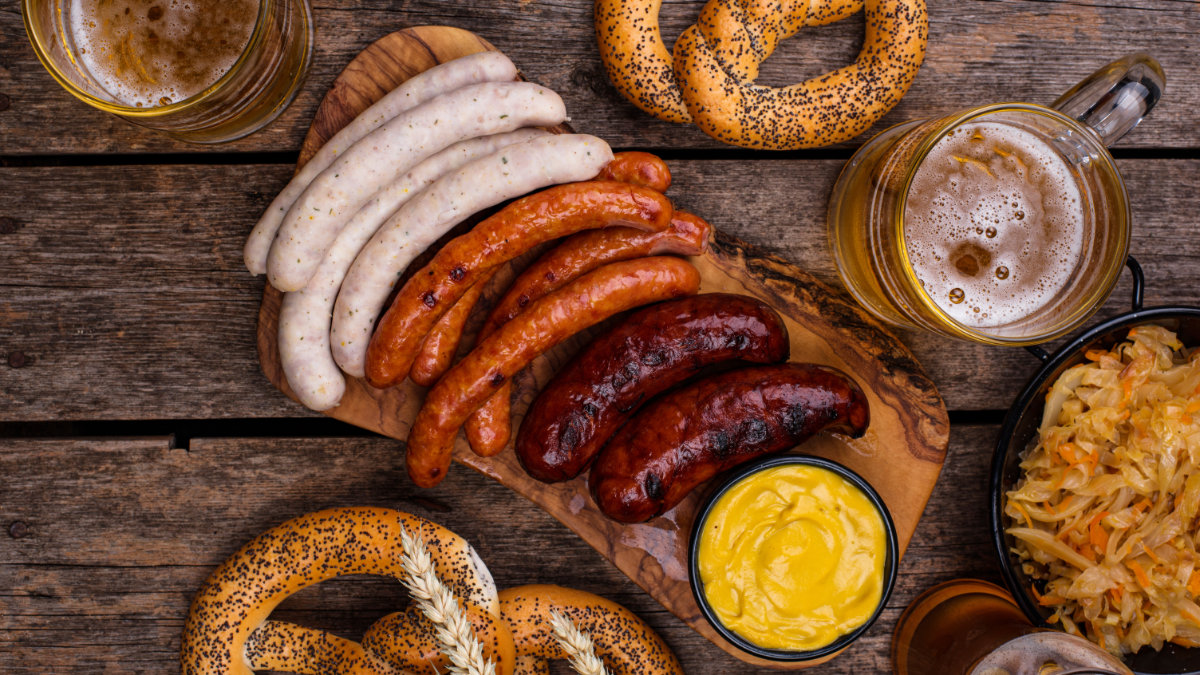 oktoberfest dishes with beer, pretzel and sausage